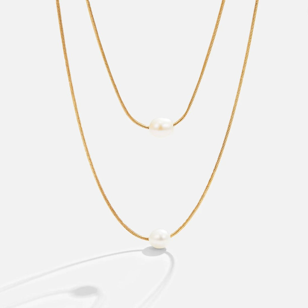 Caroline – Double Strand Gold Necklace Featuring Rich Gemstone